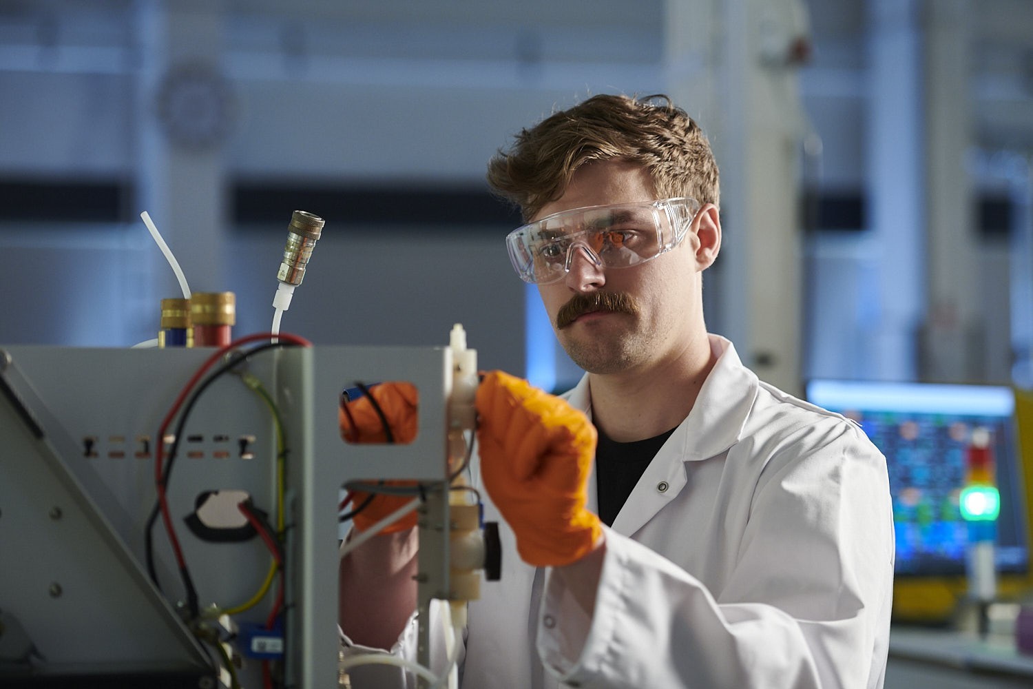 Elestor researcher conducting experiments in the laboratory